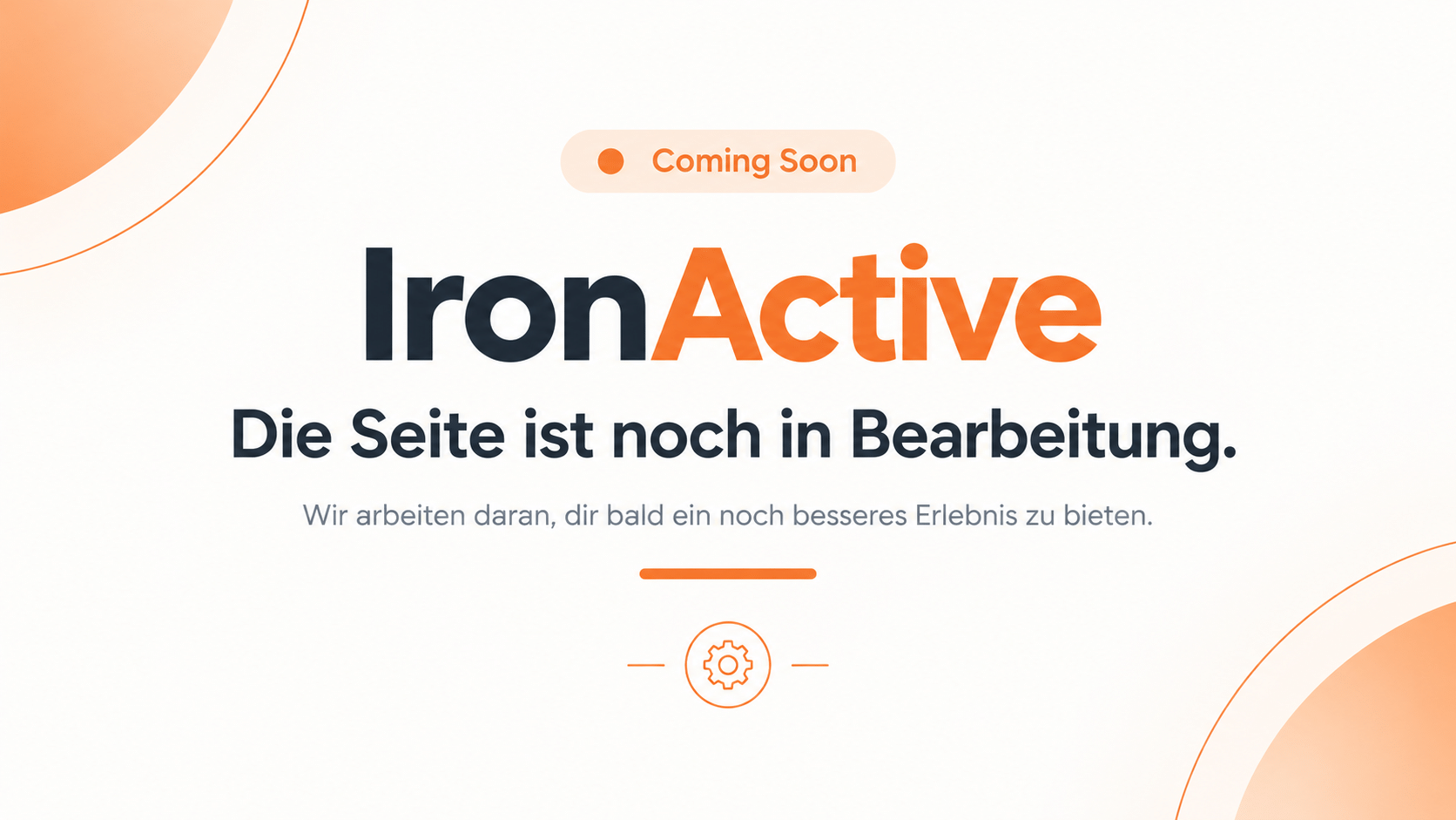 IronActive Coming-Soon-Grafik mit der Botschaft „Die Seite ist noch in Bearbeitung“ im minimalistischen Design mit orangefarbenen Akzenten.